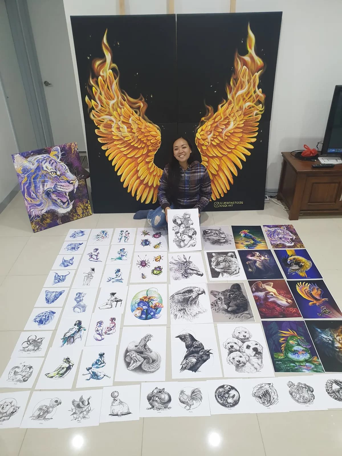 Anqi with her wings painting and prints