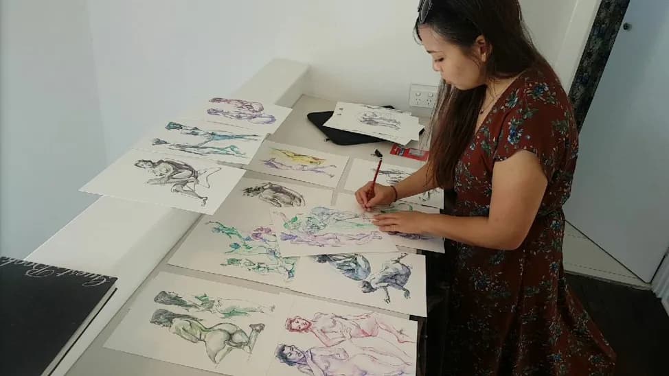 Anqi at work on a series of life drawings